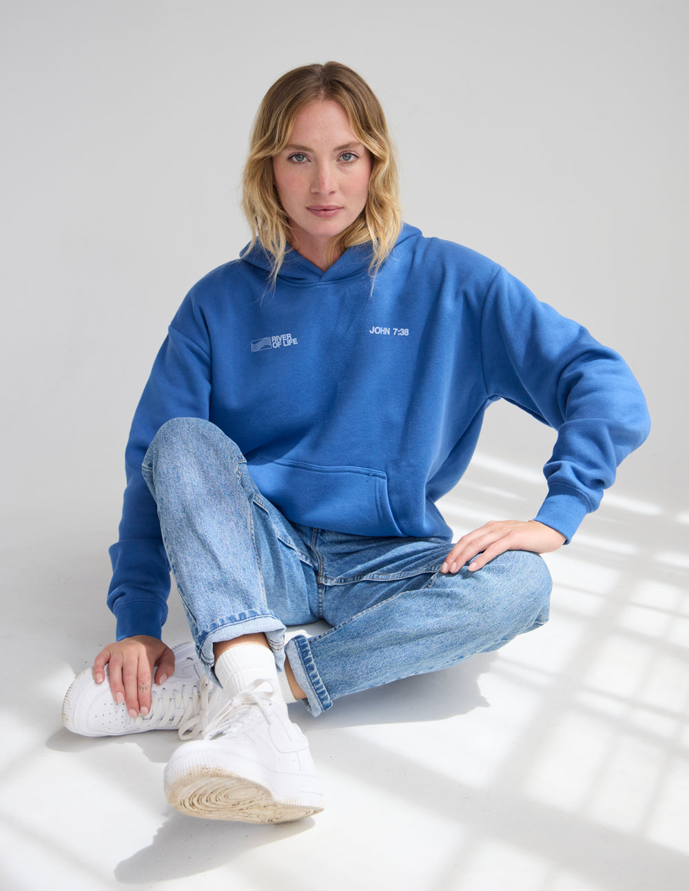 River of Life unisex hoodie featuring scripture text with a relaxed, comfortable fit.