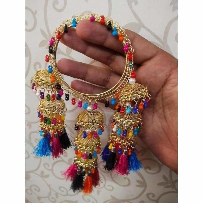 Multicolor hanging bangles featuring threads, pearls, and dangling jhumka charms.