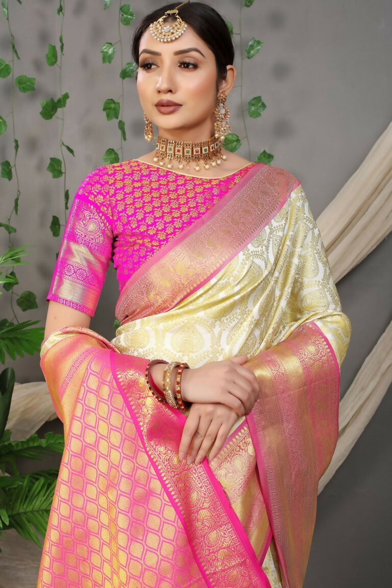 Off White Kanjivaram Silk Zari Woven Saree with Pink Blouse
