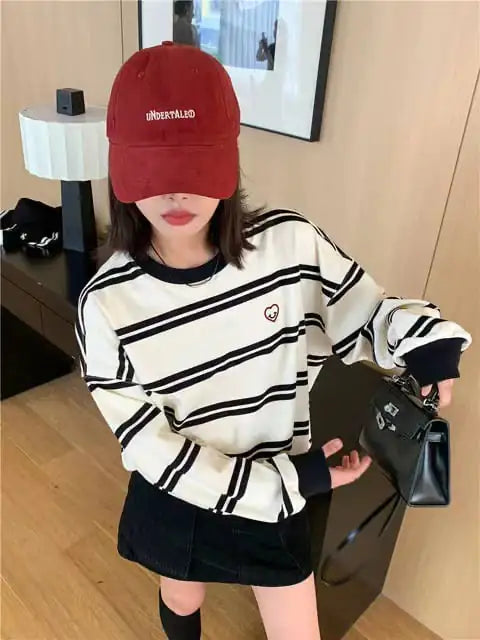 Women's Black and White Striped Pullover Sweater with Heart Detail - Image 4