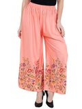 Peach palazzo pants with a beautiful floral print and a wide-leg cut.