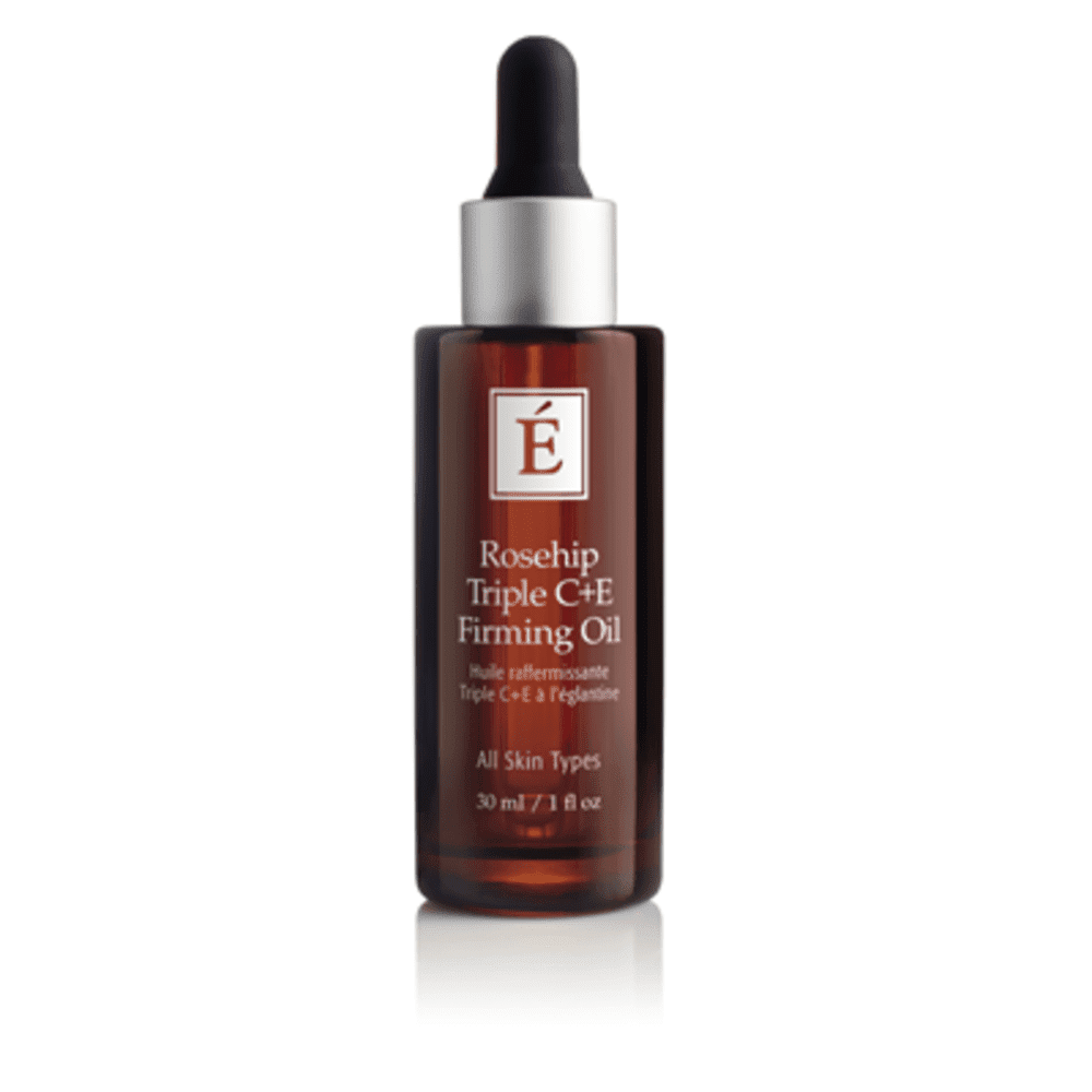 Rosehip Triple C+E Firming Oil in an amber glass bottle with silver and black labeling