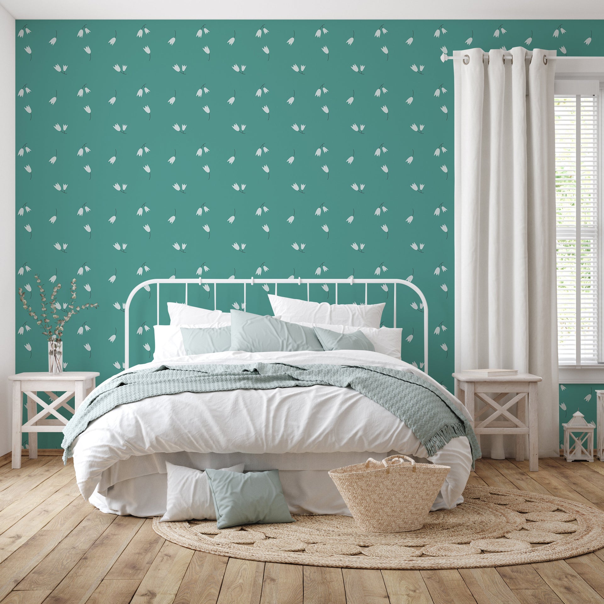 Rumi floral pattern wallpaper in teal and off-white on a minimalist bedroom wall