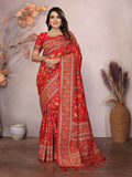 Red Meena Weaves Pashmina Saree featuring traditional patterns and an unstitched blouse piece.