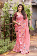 Pink pure linen saree with silver zari border and embroidered phantom silk blouse