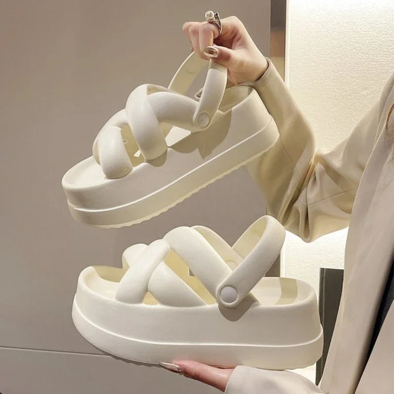 A collection of colorful thick sole platform sandals for women in various shades including black, white, pink, and yellow.