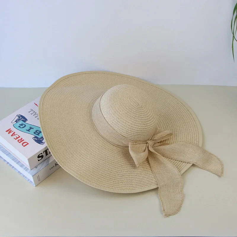 Women’s Wide Brim Summer Straw Hat with Elegant Bowknot Detail