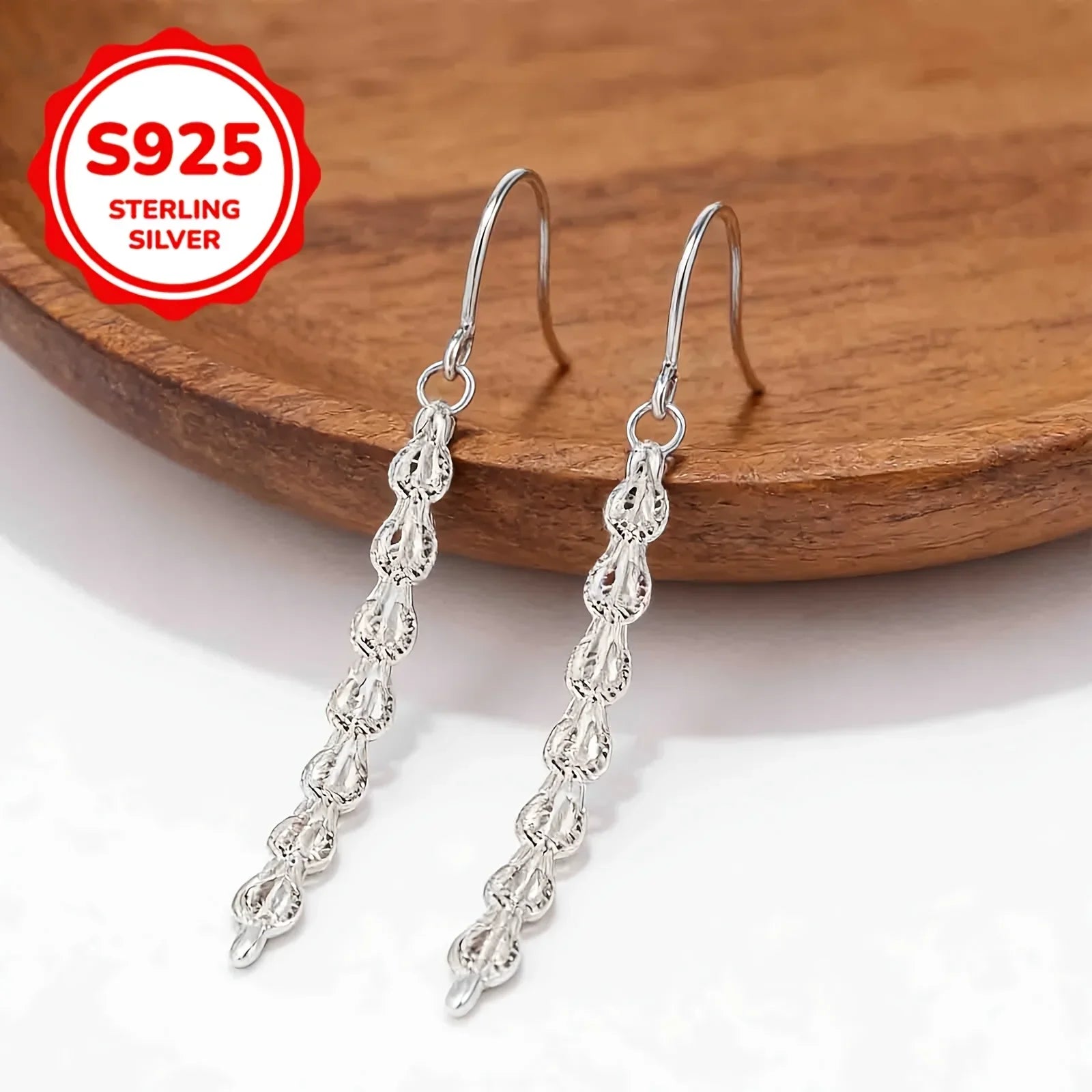 Ladies' simple and casual S925 silver phoenix-tail hook earrings, hypoallergenic earrings for daily wear by women