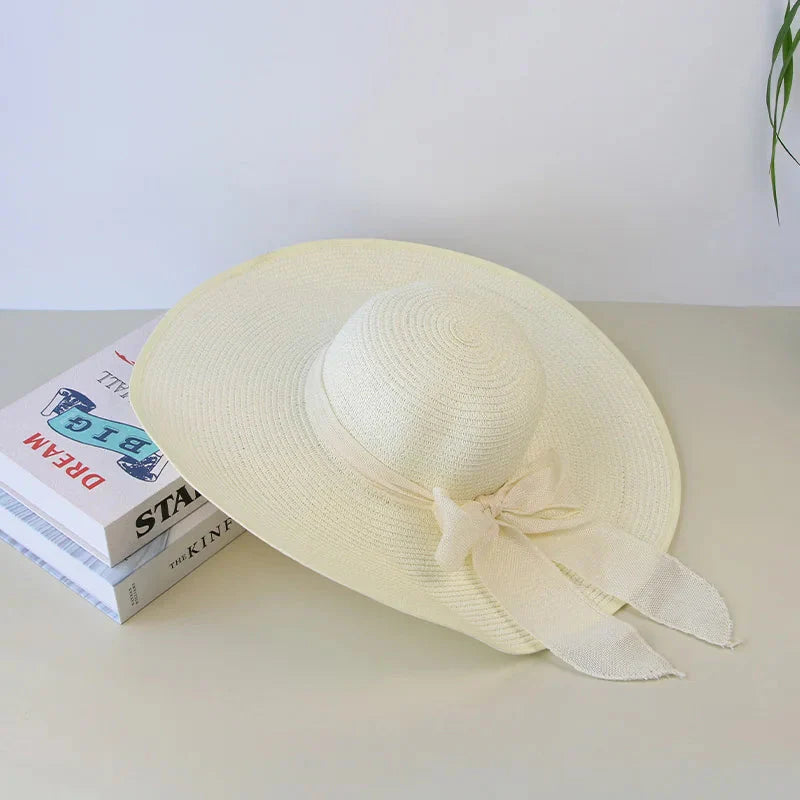 Women’s Wide Brim Summer Straw Hat with Elegant Bowknot Detail