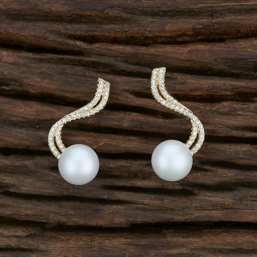 Detailed view of the Brass Golden White AD stone earrings, highlighting the brilliant stone setting.