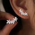 S925 silver sparkling five-petaled flower earrings elegant and fashionable wearable all year round  suitable for festive parties