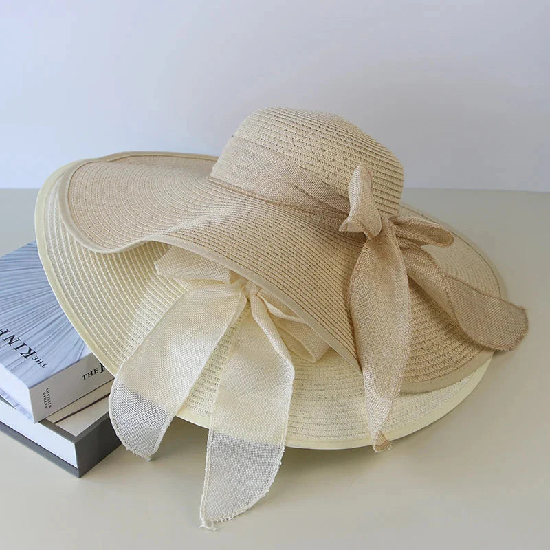 Women’s Wide Brim Summer Straw Hat with Elegant Bowknot Detail
