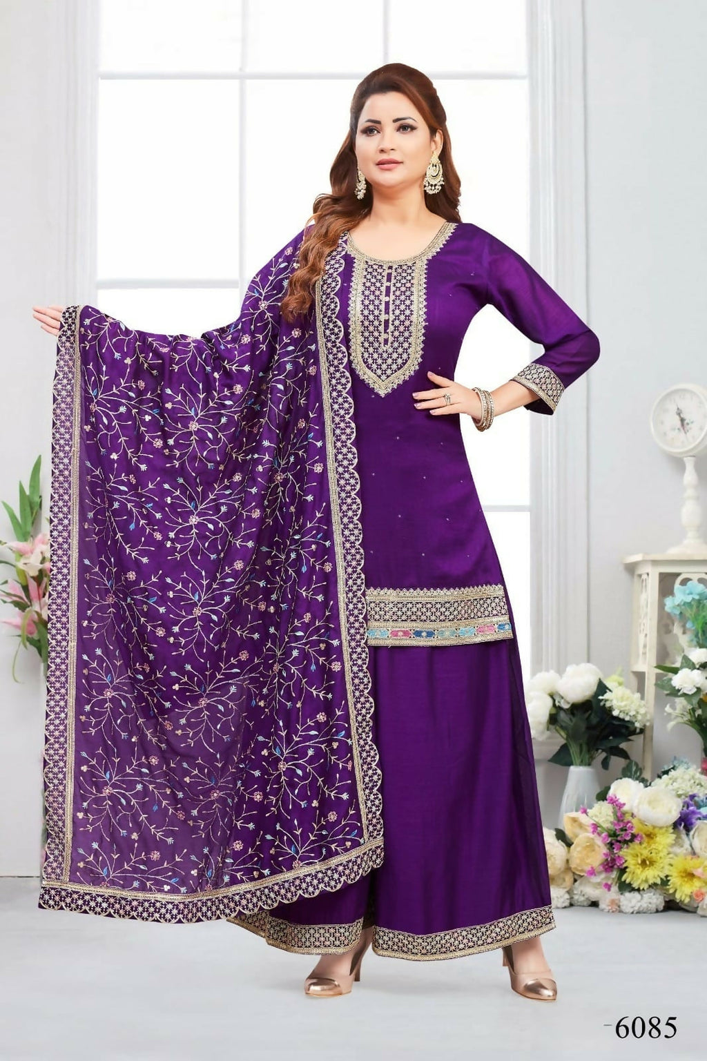 Purple muslin silk kurta set including dupatta and cotton-lined top.