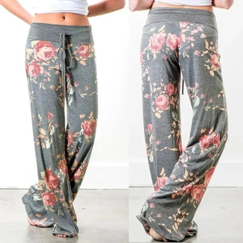 Model wearing wide-leg lounge yoga pants in grey floral print and camouflage print styles with drawstring waistband.