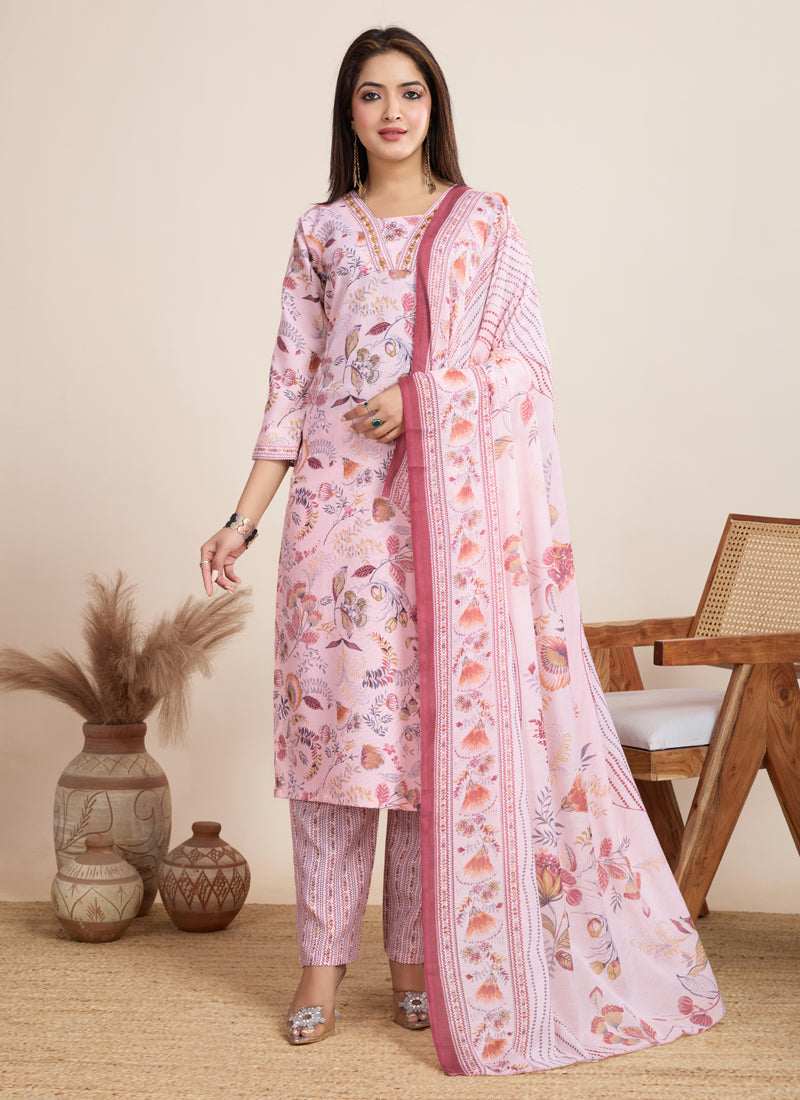 Baby wearing a light pink printed cotton blend salwar suit with matching dupatta and pants.