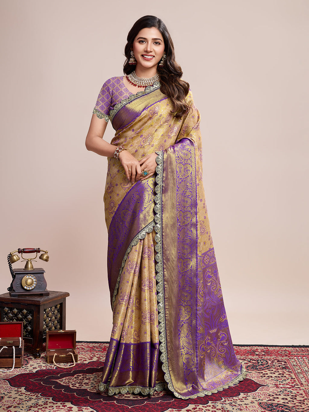 Elegant golden Kanjivaram silk saree with intricate jari weaving and unstitched blouse