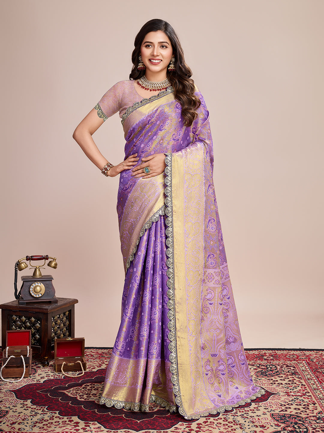 Purple Kanjivaram Silk wedding saree featuring traditional gold Jari weaving