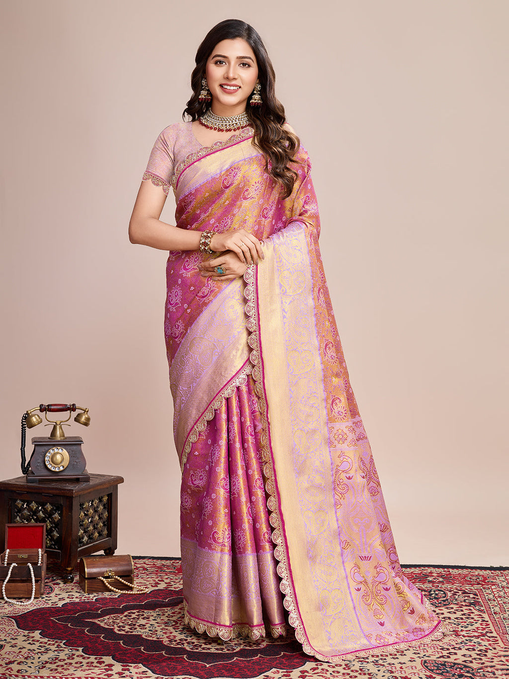 Pink Kanjivaram silk wedding saree with Jari weaving and a purple unstitched blouse piece