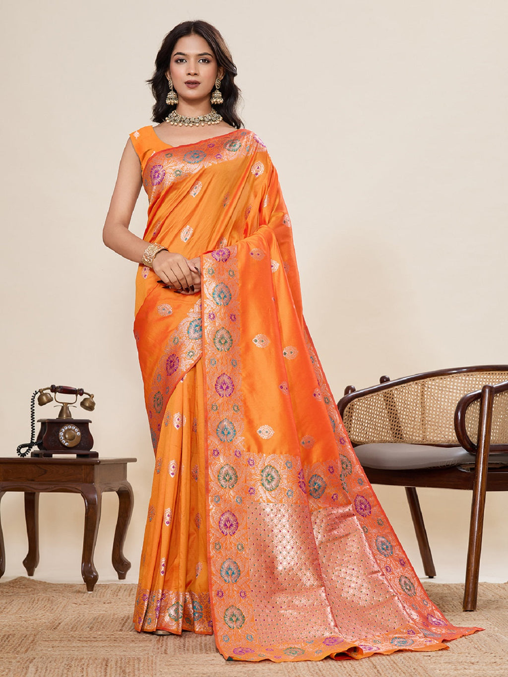 Orange pure jacquard saree with detailed golden and silver zari weaving