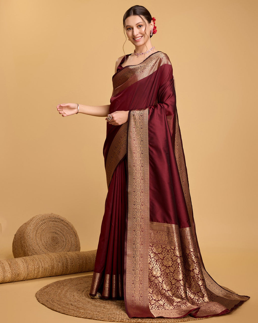 Deep Maroon Banarsi Pure Silk party wear saree with golden jar work and unstitched blouse.