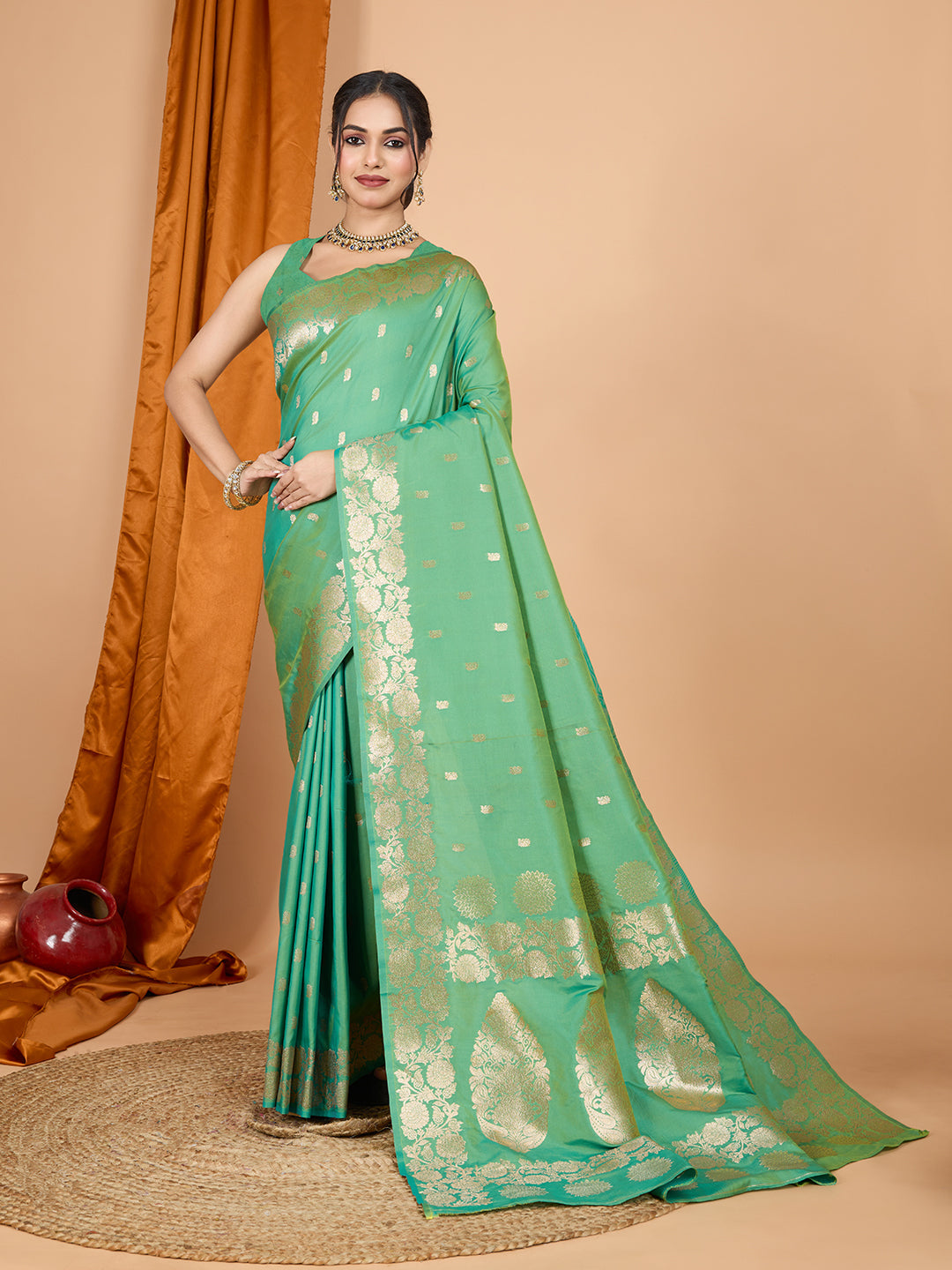 Green Banarsi silk party saree with Jari weaving and unstitched blouse