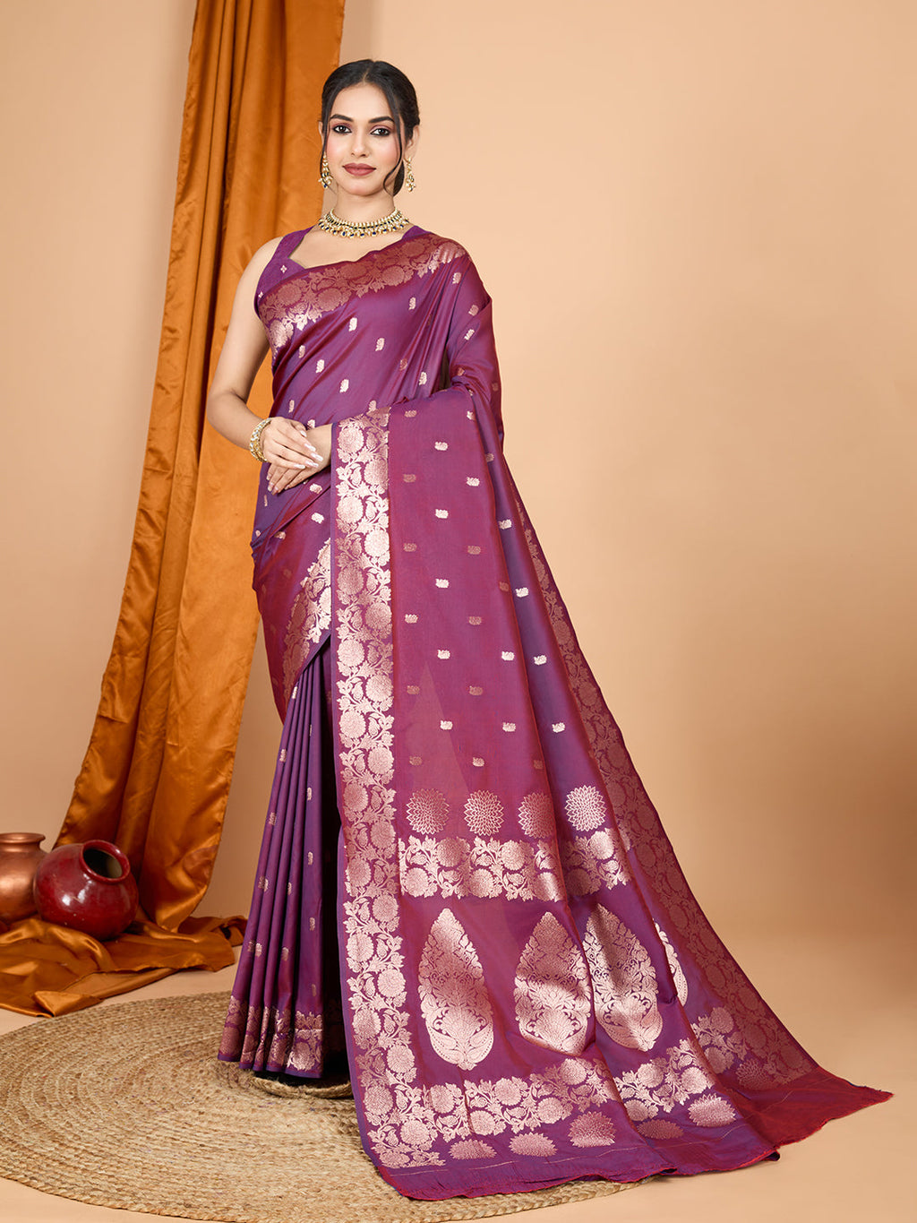 Elegant Wine Banarsi Silk party wear saree with gold Jari weaving work.