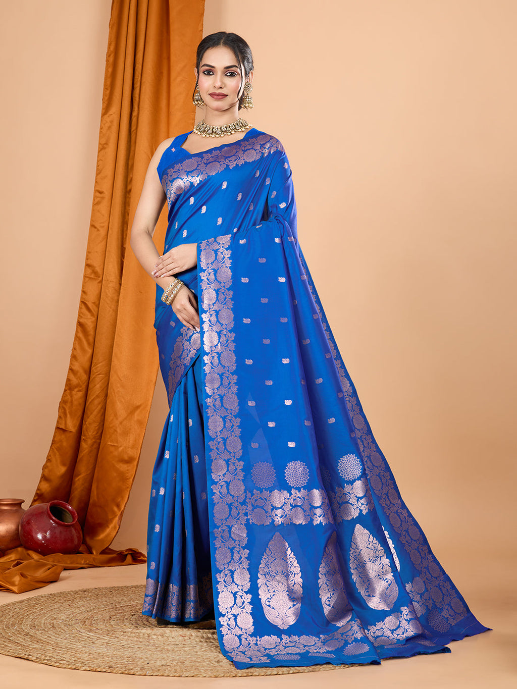 Blue Banarsi silk saree featuring detailed Jari weaving work and unstitched blouse.