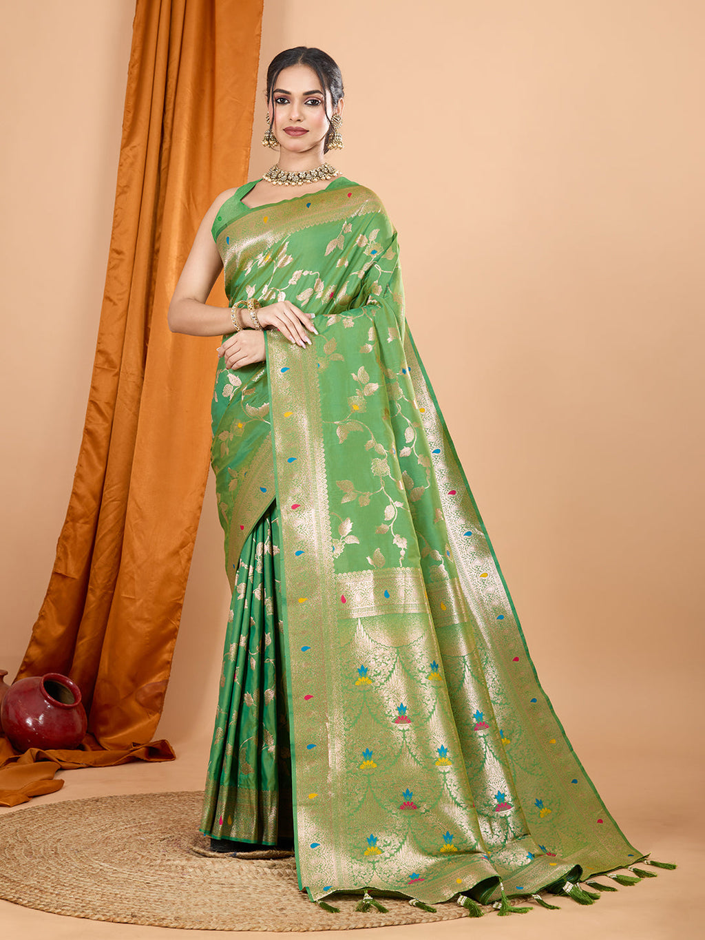Green Banarasi silk party wear saree with intricate Jari weaving