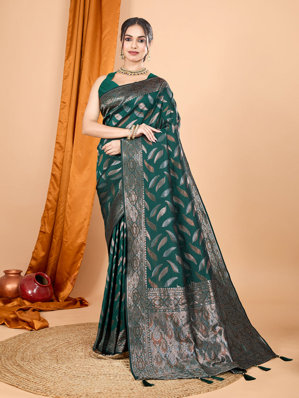 Deep green pure silk wedding saree with elaborate gold Jari weaving