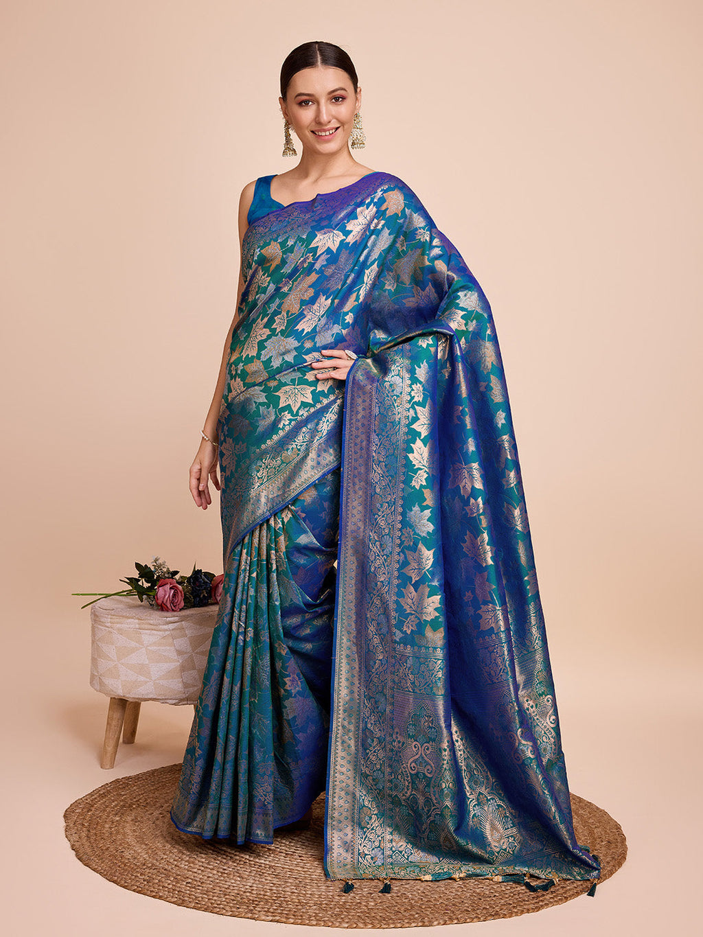 Luxury teal green pure silk saree with detailed jari weaving