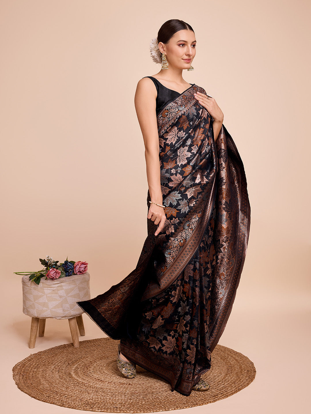 Black pure silk wedding saree featuring detailed jari weaving and unstitched blouse