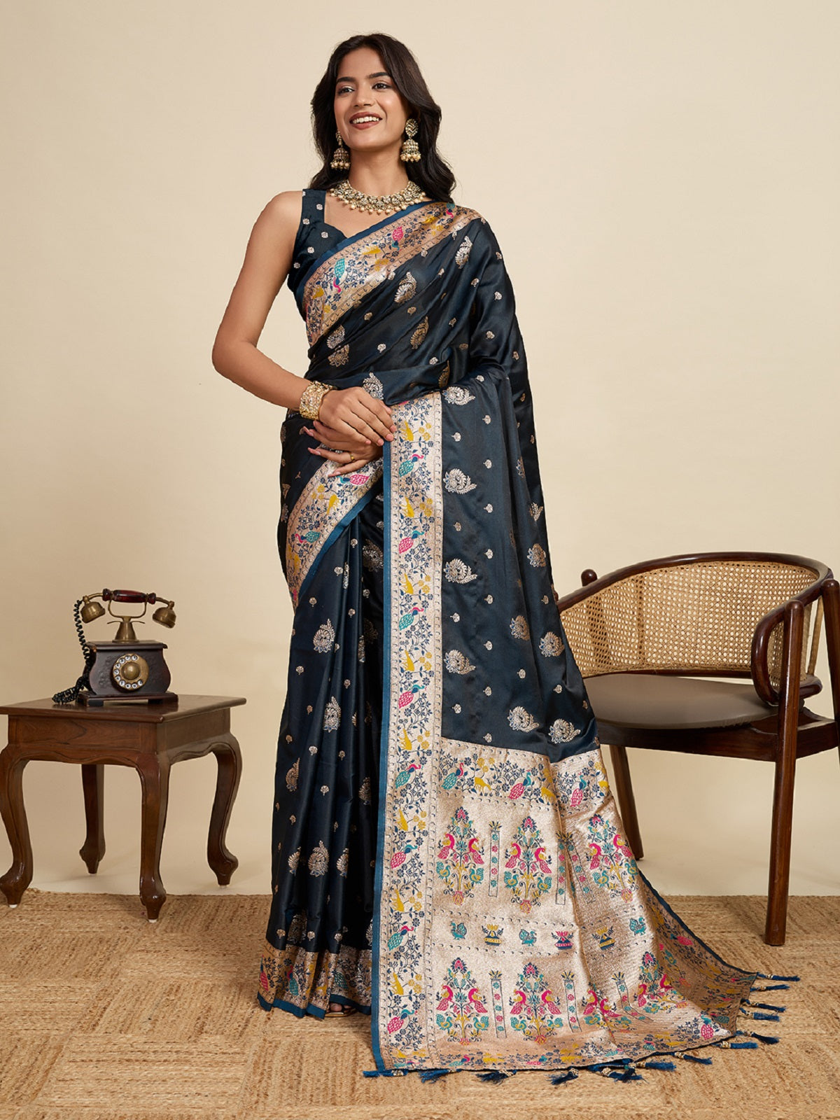 Black satin wedding saree with detailed gold Jari border.