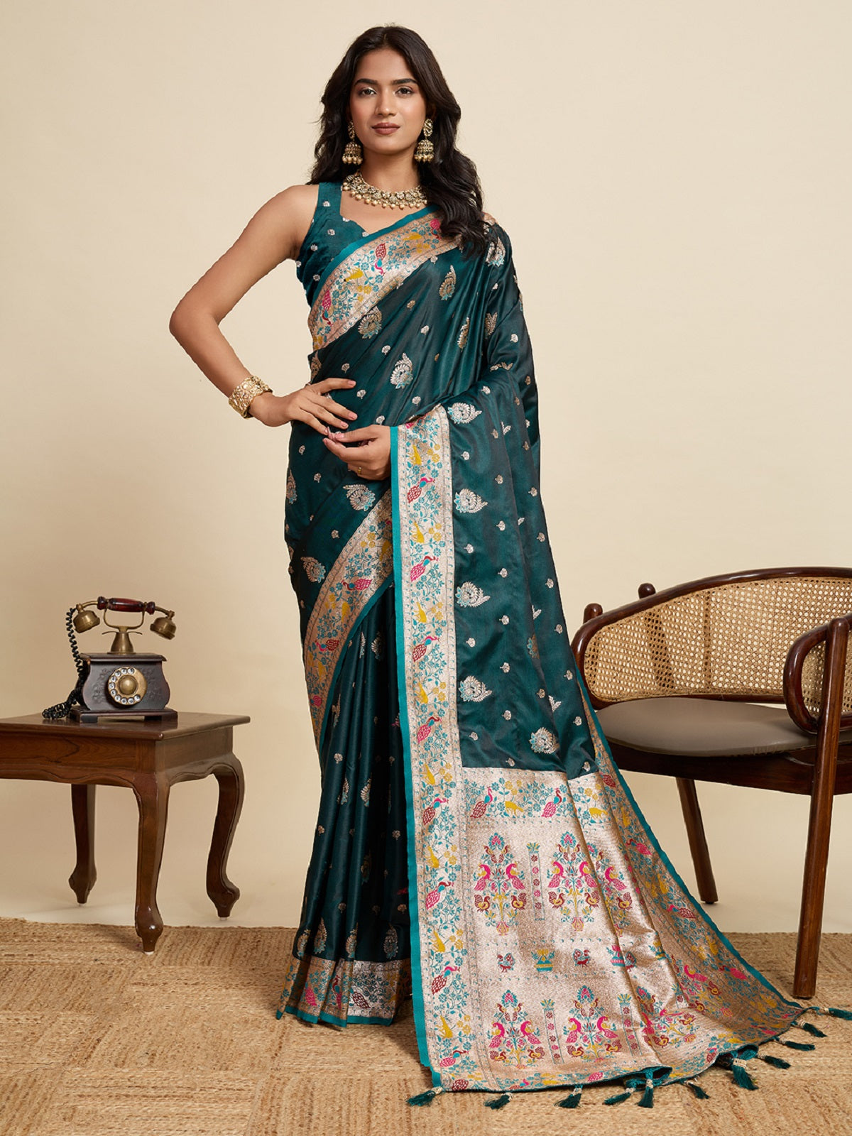 Deep Green satin wedding saree with detailed gold Jari work border.
