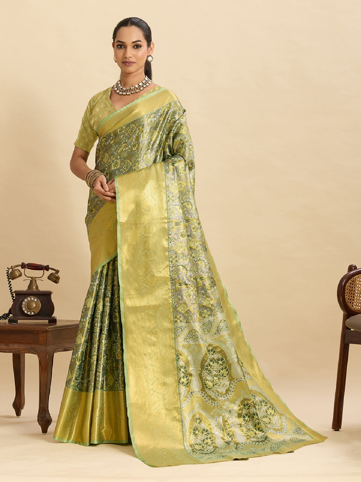Pastel green Kanjivaram silk wedding saree featuring intricate Jari weaving