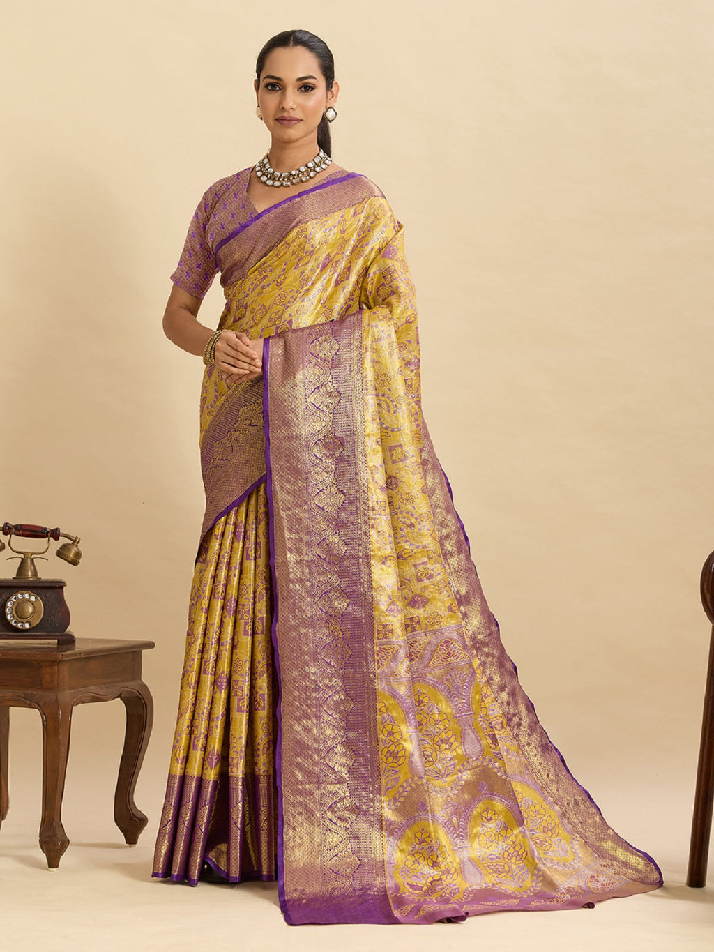 Yellow Kanjivaram Silk wedding saree with traditional Jari weaving detail