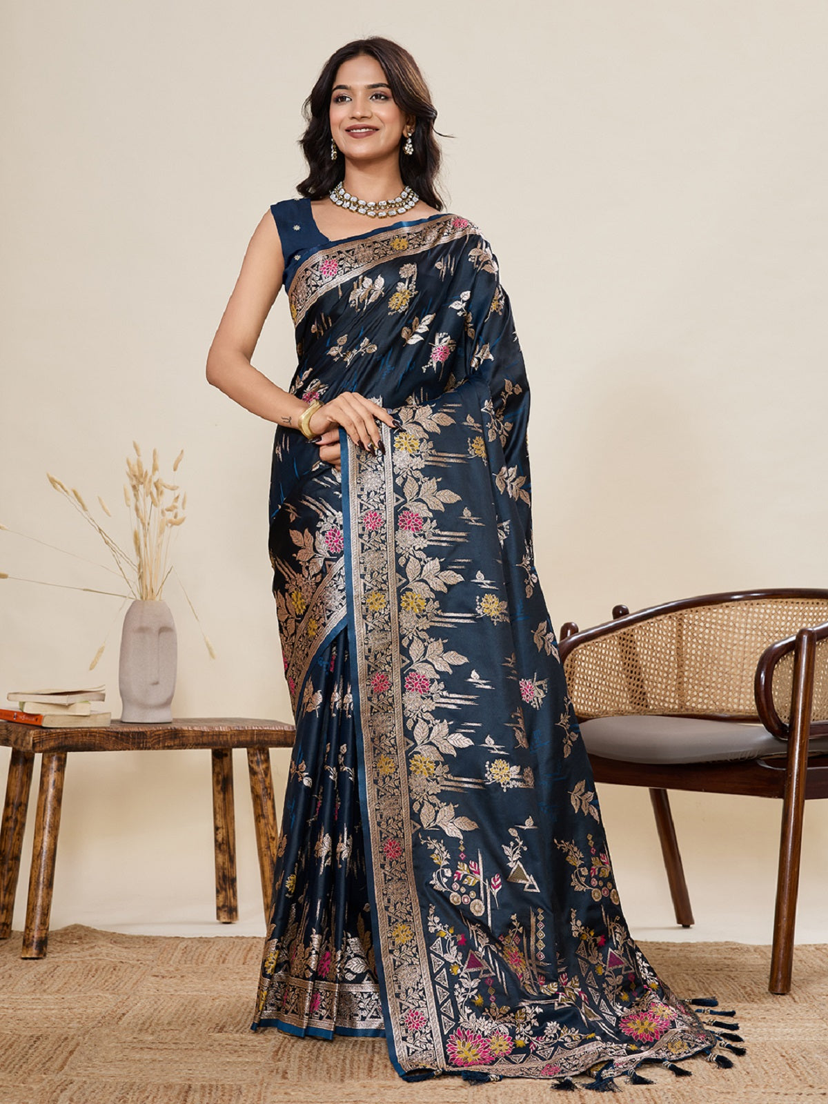 Teal Blue satin saree with traditional Paithani Jari motifs and matching unstitched blouse piece.