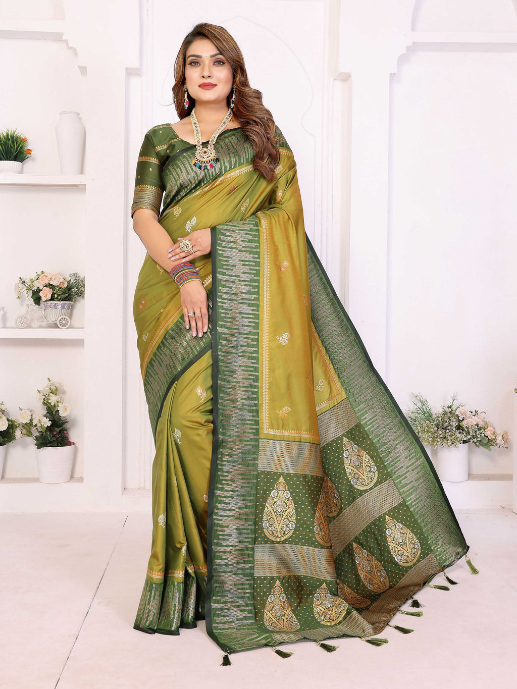 Pista Green South Soft Silk saree with detailed zari weaving and matching blouse piece