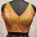 Mustard yellow jacquard fabric blouse with multi-color weave and V-neckline