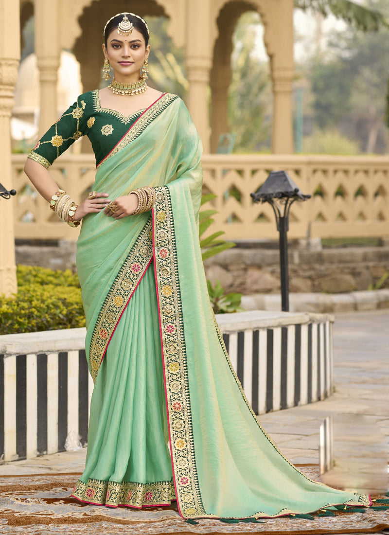 Light Green Georgette saree with intricate embroidery for wedding wear