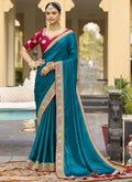 Aqua blue georgette wedding saree with detailed embroidery