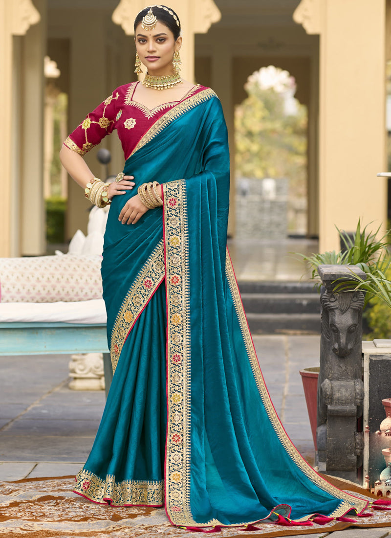 Aqua blue georgette wedding saree with detailed embroidery
