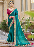 Aqua green georgette saree with detailed embroidery for wedding festivities