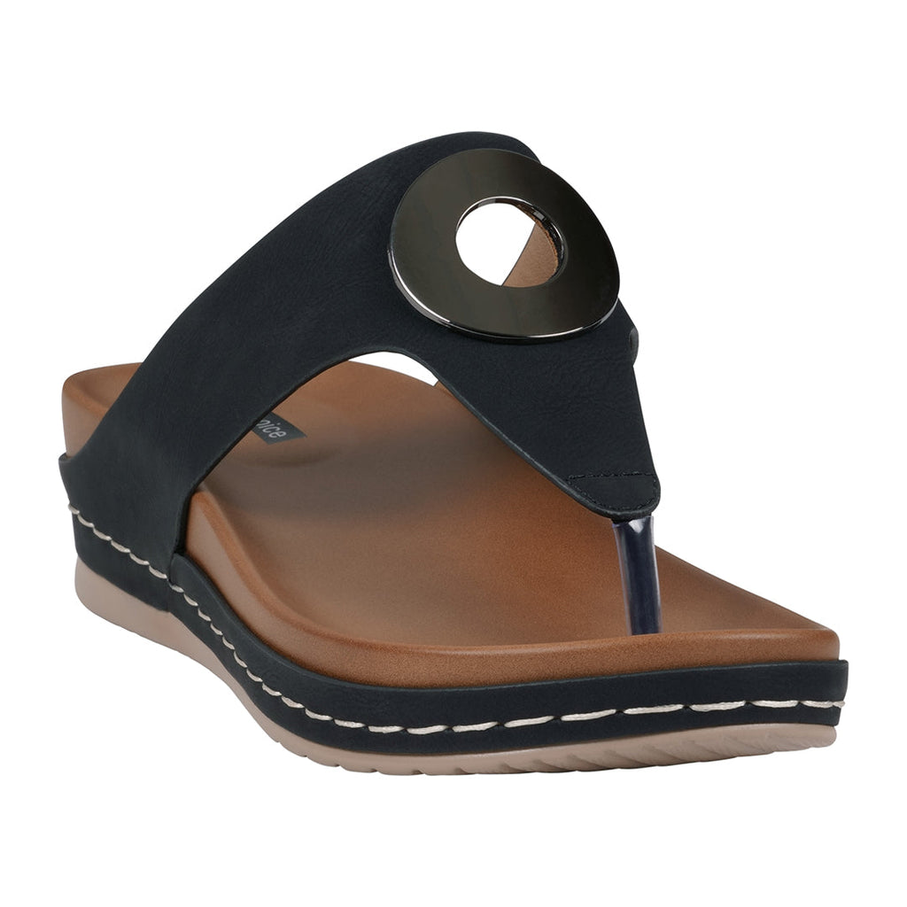 Black and tan leather thong wedge sandals with a metallic accent.