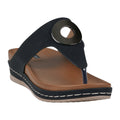 Black and tan leather thong wedge sandals with a metallic accent.