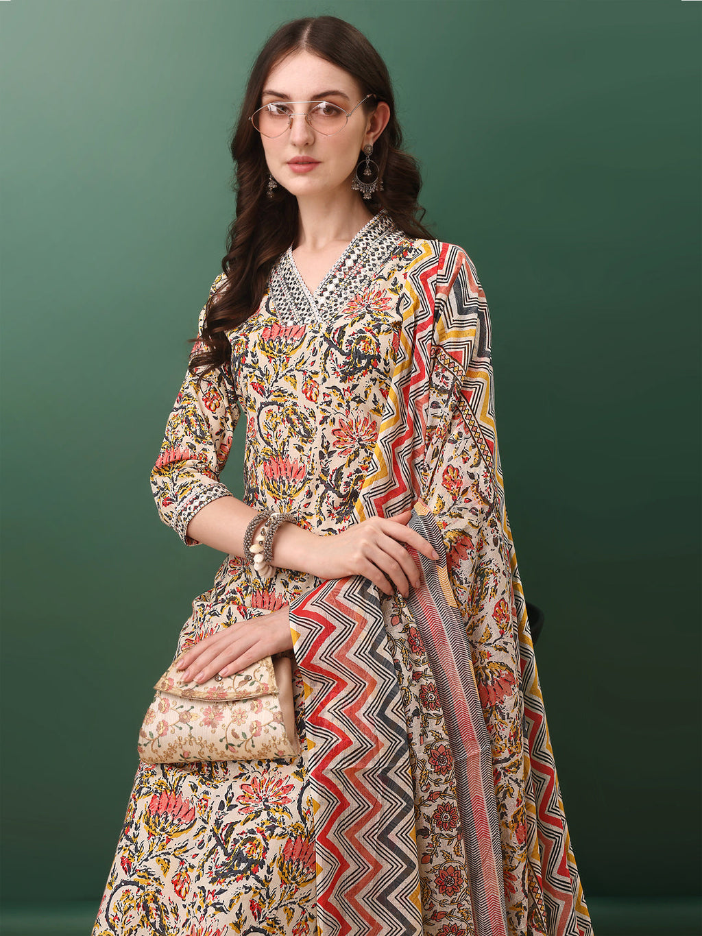 Cream cotton kurta set featuring sequined and mirror embroidery with matching pant and dupatta