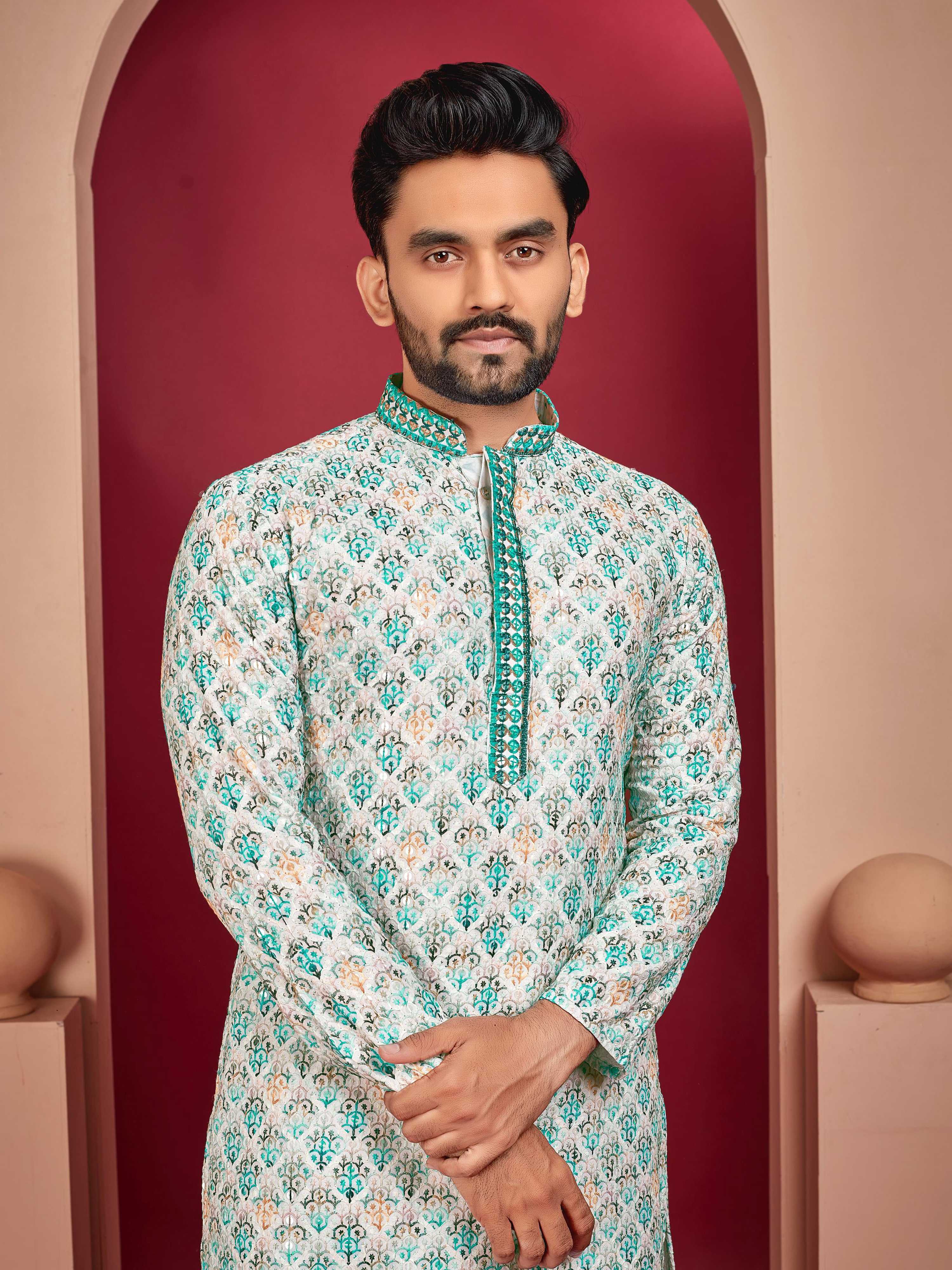 Close-up of an off-white rayon kurta showcasing detailed Lucknowi embroidery.
