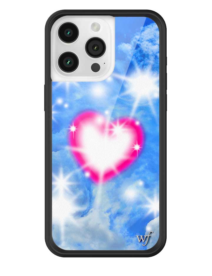 Close up of Sky Fantasy iPhone case with glowing pink heart over blue sky and cloud background.