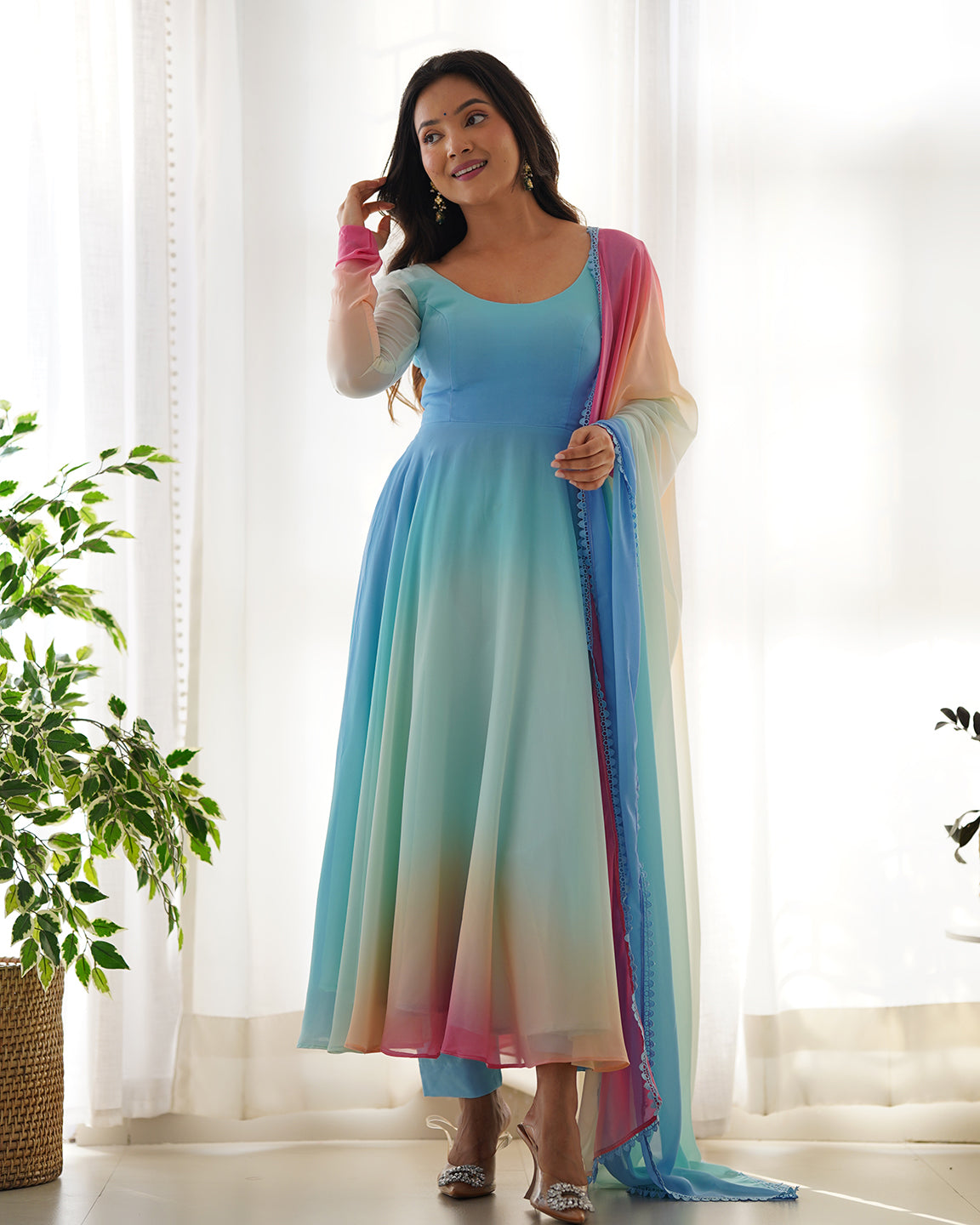 Blue Georgette Anarkali set with 6.5m flair, featuring matching pants and a flowing dupatta
