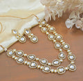 Close-up of a white Copper Polki Kundan Short Mala necklace on a neutral background.