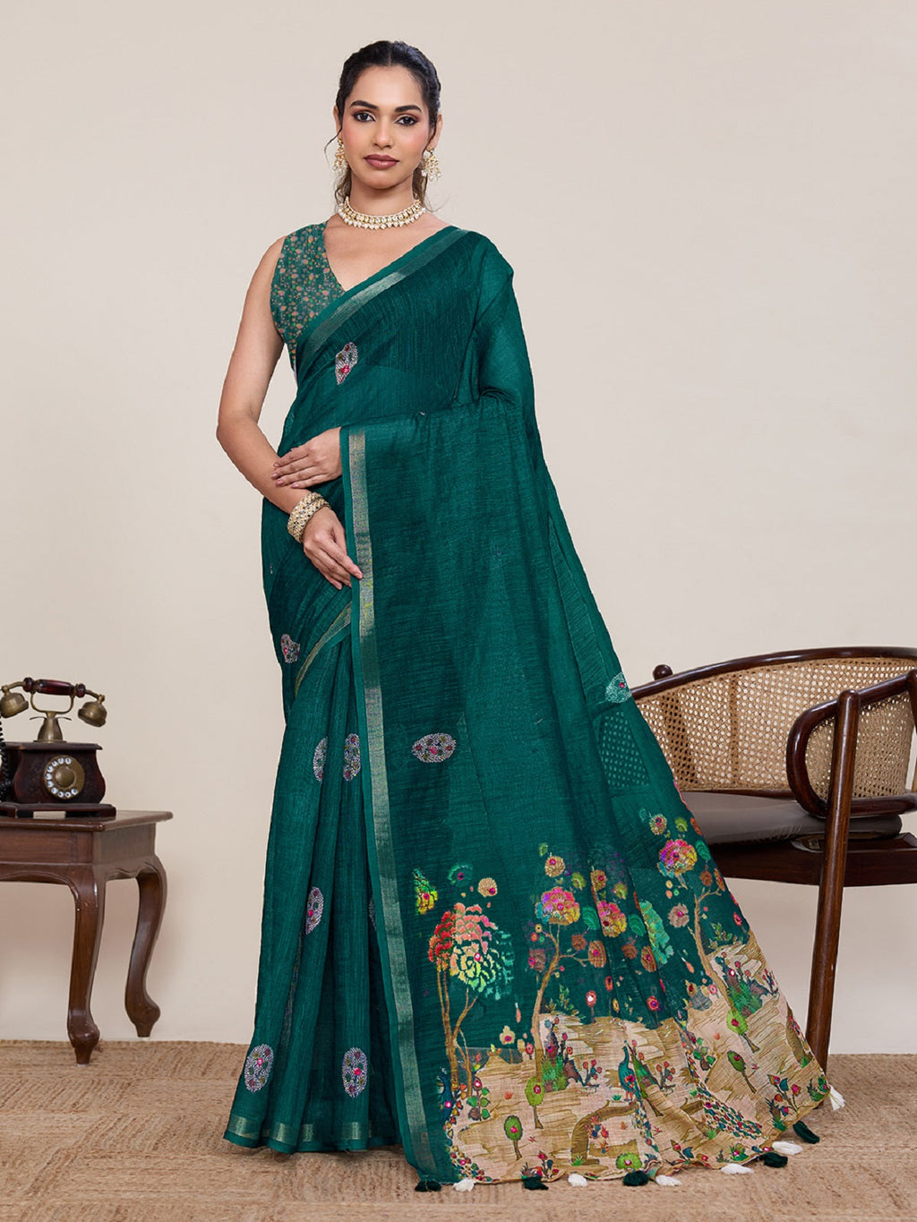Green linen saree with mirror work detailing and matching unstitched butta work blouse